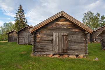 Obraz premium wooden cabins in the Swedish countryside