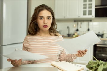 Cute woman in home kitchen