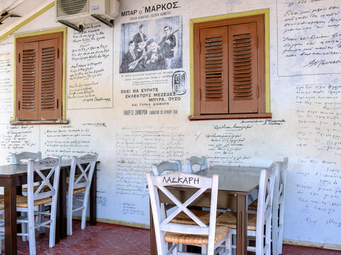 Lefkada, Greece - June 8, 2021: Traditional Greek tavern in Lefkada town without people.