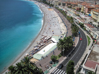 Aerial view of the city. Panoranic landscape of seaside promenade in the old town in Nice, France. People enjoy life on vacation on the Cote d'Azur.