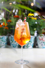 Proseco aperol with orange juice and ice.
Refreshing drink, culinary photography.