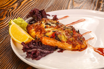 Baked salmon steak with cheese
