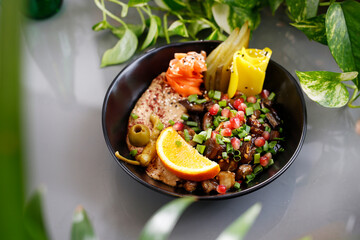Humus with a patch of mushrooms and vegetables.
Vegetarian dish, food photography, serving proposal.