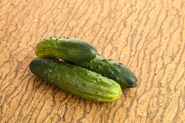 Fersh juicy green cucumbers heap