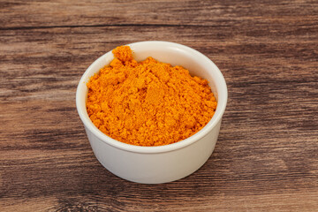 Tumeric powder in the bowl