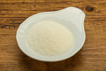 White sugar in the bowl