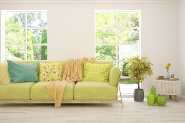 White living room with sofa and summer landscape in window. Scandinavian interior design. 3D illustration