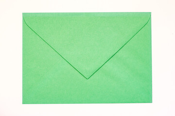green vintage paper envelope isolated on the white