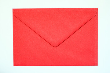 red vintage paper envelope isolated on the white