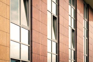 modern building background with rows of glass windows