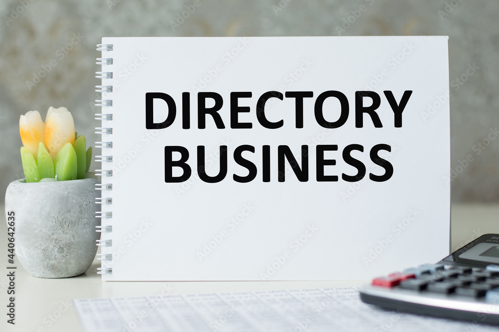 Poster notepad with text directory business on a white background, in calculator and decaractive flower. bu