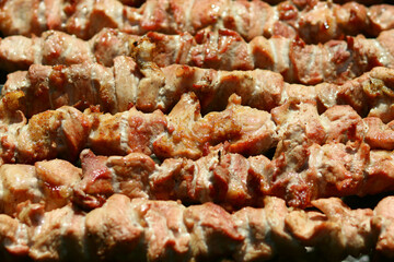 Meat cooked on skewers on the grill, barbecue in nature