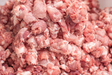 Ground pork mince. Minced pork after meat grinder
