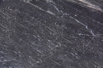 Marble background with aged stripes in black and white