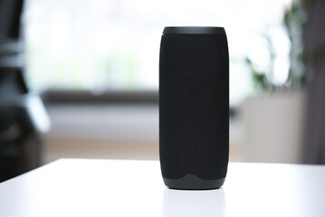 Smart speaker on table, intelligent assistant