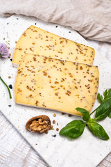 Cheese collection, matured cow cheese with mustard seeds from Belgium