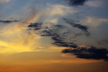 Fototapeta premium Dark clouds in the sky at sunset