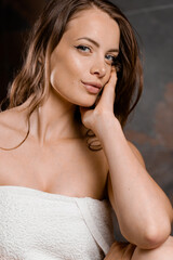 Naklejka premium Close up portrait of woman after shower. Girl looks like Angelina Jolie.