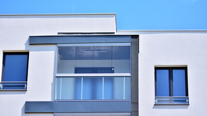 Modern apartment building in sunny day. Exterior, residential house facade.
