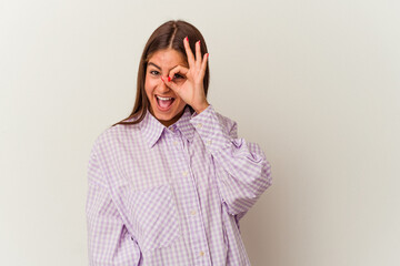 Young caucasian woman isolated on white background upset screaming with tense hands.