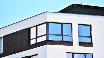 Modern apartment building in sunny day. Exterior, residential house facade.