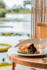 Perfect Delicious Dish Menu Steak Tuna Fish Bacon Risotto Chicken Salad Chef Made Detail Food Gourmet On a Wooden Table