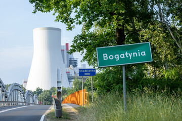 Bogatynia city limit road sign. Bogatynia is a Polish town bordering Czech Republic and Germany, famous for its large electric power station.