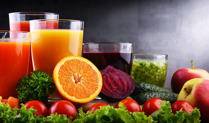 Glasses with fresh organic vegetable and fruit juices