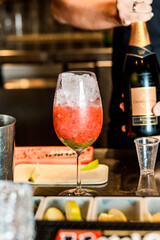 Barman Preparing Beautiful Cocktail Drink Ice Red Strawberry Green Apple Garnish Gourmet Restaurant