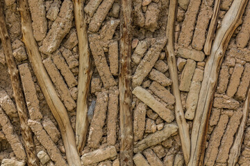 Adobe and wooden wall of a house in Marguzor village in Haft Kul in Fann mountains, Tajikistan