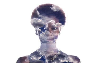 Multiple exposure image with clouds and sky inside african american woman portrait. Mental health...