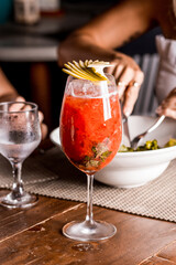 Couple Cheers Drink Toast Holding Glass Red Strawberry  Green Apple Garnish Recipe Menu Restaurant Night Love