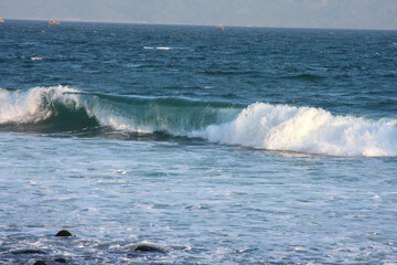 waves crashing on the beach