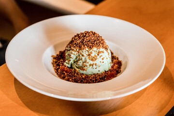 Delicious Ice Cream Dessert Close Up Basil Flavor Cashow Nuts Spoon Texture Menu Restaurant Gourmet Wooden Table