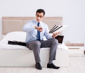 Businessman working in hotel room