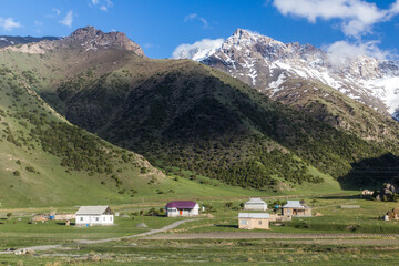 Fototapeta na wymiar Small village in southern Kyrgyzstan near Sary-Tash village