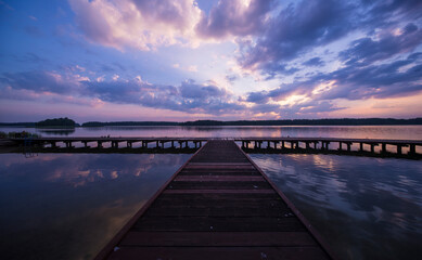 Fototapeta na wymiar Whole view Mazury lakes in Poland just before daybreak / after dawn. Wide angle Landscape scene.