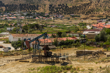 Fototapeta premium Oil derrick in Baku suburbs, Azerbaijan