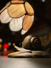 old snail shaped lamp