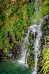 Fototapeta na wymiar Viola beach waterfall with blur of water movement, São Miguel - Azores PORTUGAL