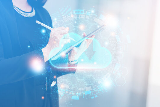 Business people use laptops to analyze and protect businesses using high-end operating systems, processing credentials through cloud computing, cloud-based business information technology.
