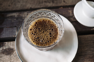 barista dripping coffee and slow coffee bar style