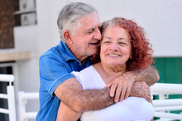 portrait of senior couple, National Day of the Elderly, International Day of the Third Age, s3nior life, elderly woman with red hair