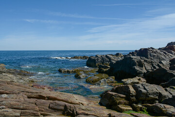 Rocky Maine coastline with Atlantic ocean crashing into it