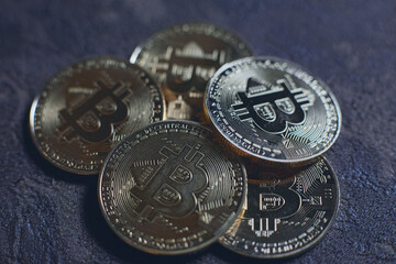 Bitcoin coin cryptocurrecny of future. Concept of e-commerce, e-business and finance. Isolated on brown background