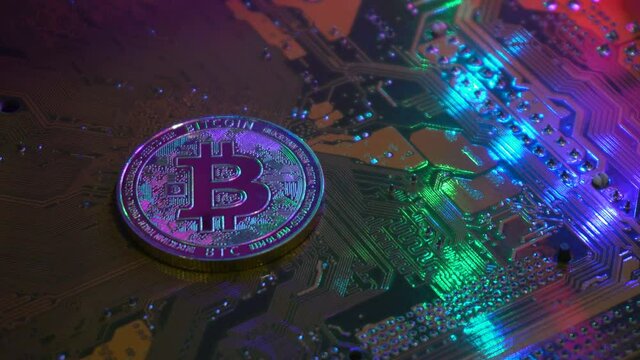 Golden bitcoin coin on server computer motherboard It is the currency that is exchanged and popular today in every country in the world. Concept business technology. Copy spece background