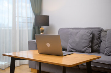 Notebook on the table in living room at home