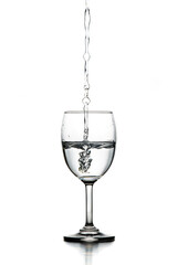 water splash in glasses isolated on white