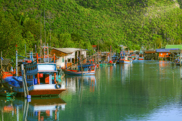 Fototapeta na wymiar Fishing boats in a fishing village, mooring from fishing in Thailand