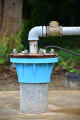 The water flowing artesian well from the land Install the pump ready to use